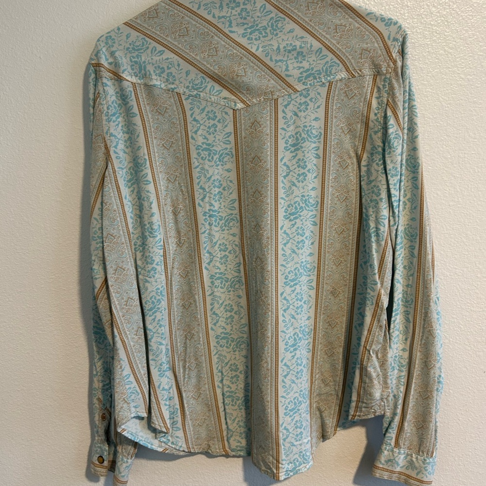 Cruel denim brand barely worn. Sky Blue with a dark yellow western designs